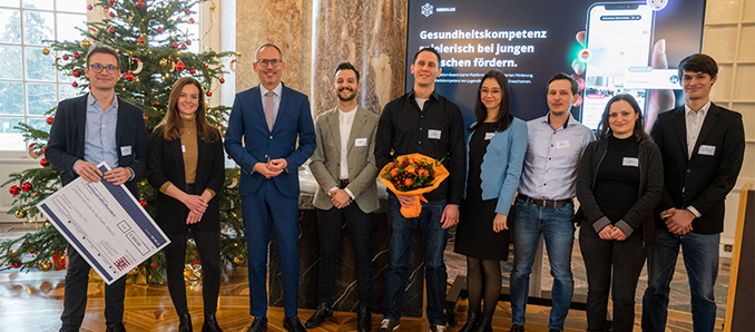 Das komplette Nebolus-Team der Hochschule Fulda mit dem hessischen Sozialminister Kai Klose (3. v.l.) bei der Preisverleihung in Wiesbaden. Foto: Andreas Mann / Andreas Mann Business-Fotografie